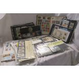 Stamps - FDC's, unmounted mint presentation packs and stamp album