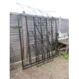 Pair of very large metal driveway gates and one smaller