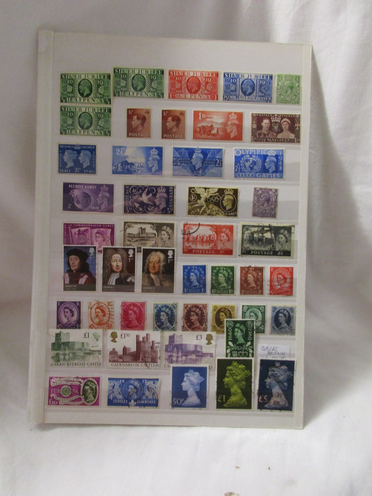 Sheet of 46 GB stamps - Some fine used & M/M - George V to Elizabeth II