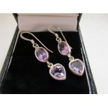 Pair of silver and amethyst set earrings