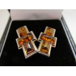 Pair of silver and amber set earrings