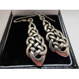 Pair of silver earrings