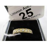 Gold half hoop ring set with 7 good diamonds