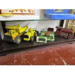 Collection of vintage toys to include tin plate van and Tonka toy diggers (whole shelf)
