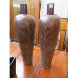 Pair of tall wooden vases