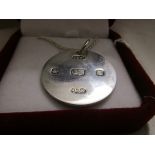 Heavy boxed circular silver pendant hallmarked Birmingham 2003