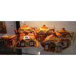 Collection of teapot cottages to include Price