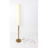 A 1970's beech turned standard lamp with a tall shade CONDITION REPORT: Shade