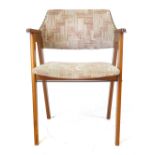 A 1970's teak and upholstered desk chair on square straight feet CONDITION REPORT: