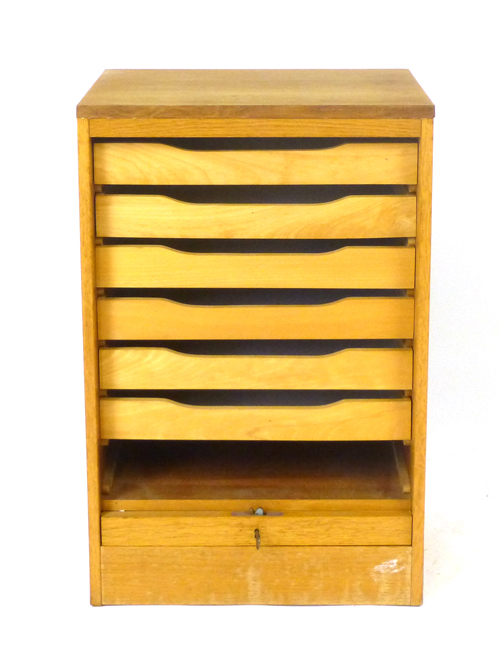 A 1970's oak tambour door cabinet, the interior with fitted shelves, on a plinth, h. - Image 2 of 2