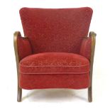 A 1940's beech and upholstered lounge armchair on square sweeping feet CONDITION REPORT: