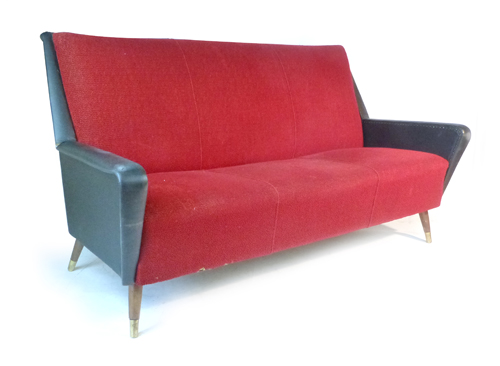 A 1950's G-Plan type black vinyl and red upholstered three seater sofa on teak tapering feet with - Image 2 of 2