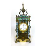 A late 19th century and later mantel clock, the movement striking on a bell,