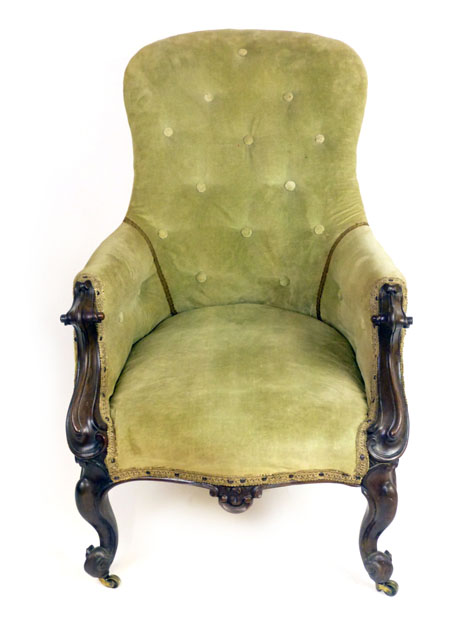 A Victorian Rosewood and green velvet button back upholstered salon chair,