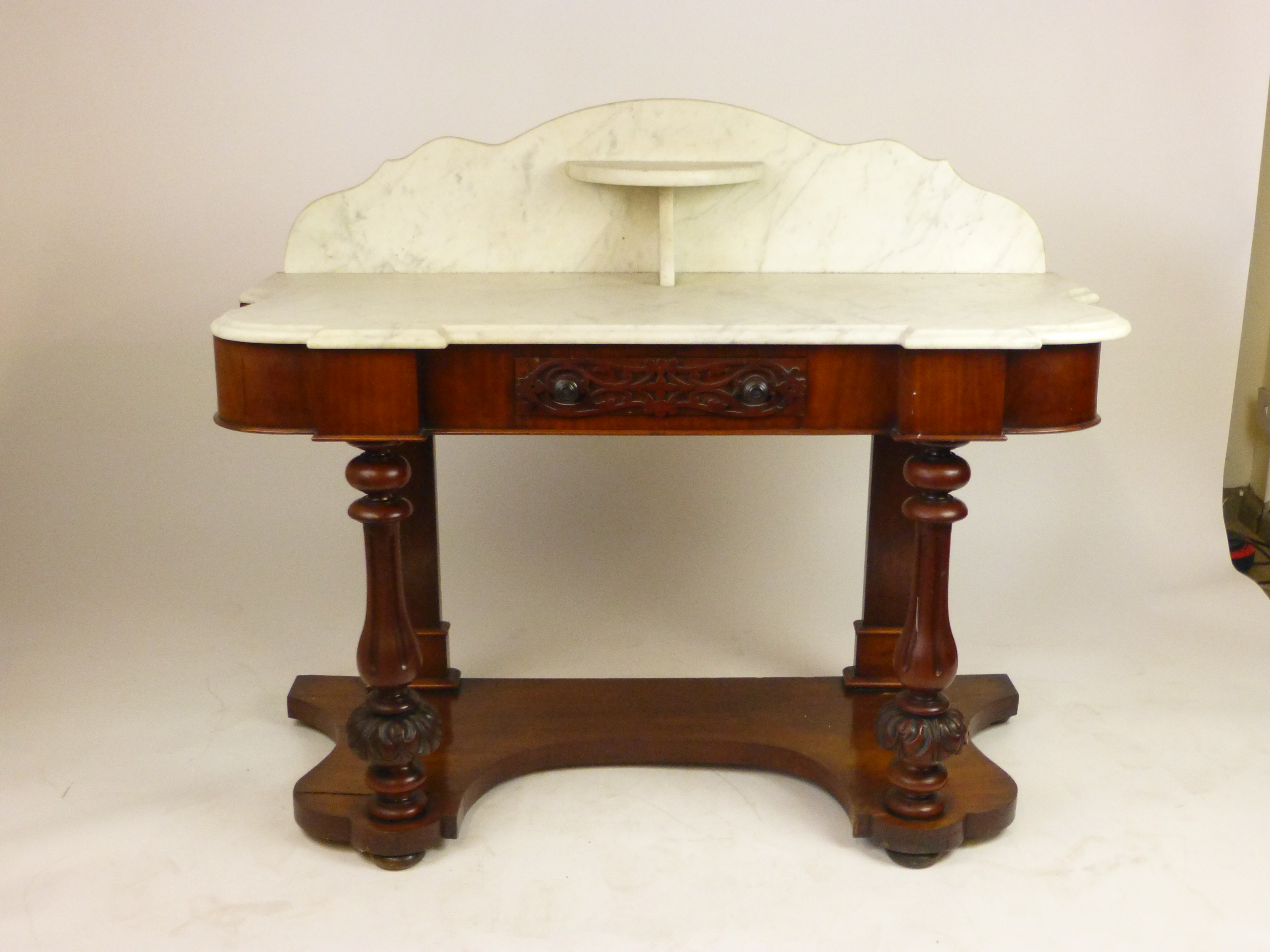 A Victorian mahogany marble topped 'Duchess' washstand,