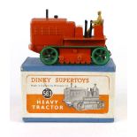 A Dinky Super Toys heavy tractor, number 563, in original box with orange painted body,