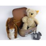 A Stieff for Past Times Harry in suitcase stuffed bear together with a Stieff original Possy