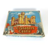 A boxed crusaders castle by Cleeware in original box together with various crusader soldiers,