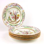 A set of six Masons Ironstone plates decorated with exotic birds within floral borders with orange