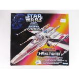 A 1995 Kennar Star wars X-wing fighter in original box,