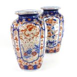 A pair of 19th century Chinese four panel vases decorated in the Imari palette, h.