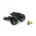 A Britains 18 inch Howitzer field service diecast model field gun with rear loading cartridges and