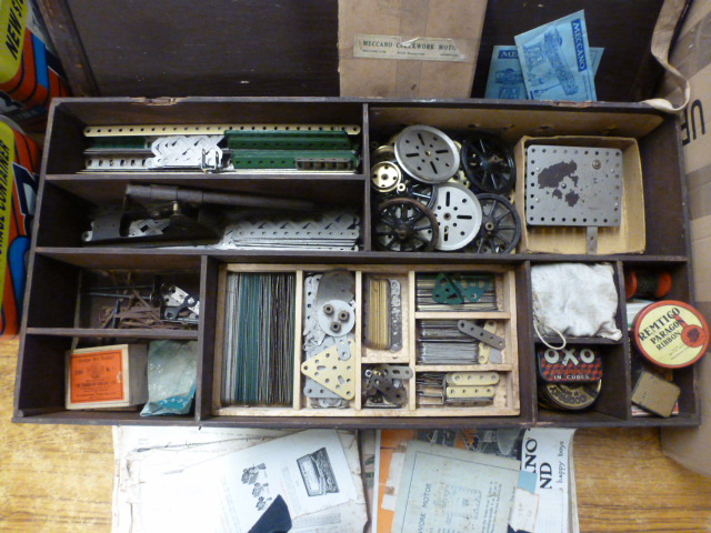 A lift top wooden storage box containing an assortment of various Meccano pieces to include wheels, - Image 9 of 10