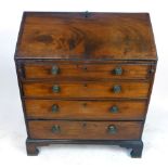 A George III mahogany bureau,