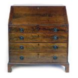 A mid 18th century mahogany bureau,