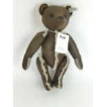 A Stieff 2012 collection brown teddy bear in leatherette fur design