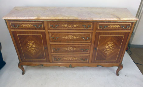 A Louis XV-style kingwood,