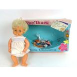 A boxed Tiny Tears doll by Palitoy in original box with dummy,