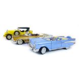 A 1-18 scale 57 Chevrolet bel air in blue with opening doors and bonnet together with a 1-18 scale