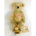 A Steiff 1920's classic blonde mohair hair together with a steiff cosy friend key chain teddy bear