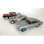 A 1-18 scale model of 55 Ford Fairlane crown Victoria together with 1957 Chevrolet Corvette gasser