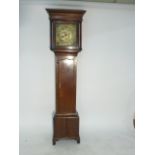 An 18th century oak longcase clock, the brass face having spandrels, pierced hands,