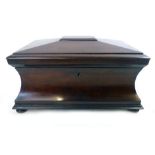 A Victorian mahogany concave sarcophagus tea caddy with fitted interior,