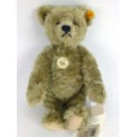 A Steiff classic series 1920's style movable jointed bear with growl in golden brown mohair