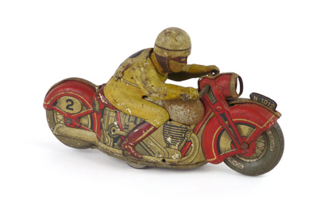 A Schuco sport tinplate clockwork motorcycle with rider, base colour of the motorcycle being red, - Image 3 of 3