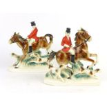 Two pairs of 19th century flatback figures modelled as spaniels together with a pair of similar