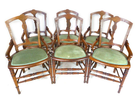 A set of six late 19th century walnut dining chairs, stamped Gillow & Co Lancaster,