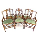 A set of six late 19th century walnut dining chairs, stamped Gillow & Co Lancaster,