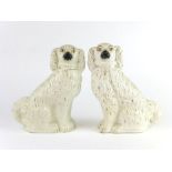 A pair of late 19th century Staffordshire flatbacks modelled as Spaniels, h.