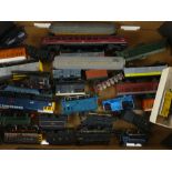 A collection of OO gauge locomotives, carriages, cars etc.