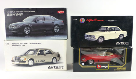 Four boxed one-eighteenth scale cars to include Jaguar E type, Auto Art Mercedes Benz,