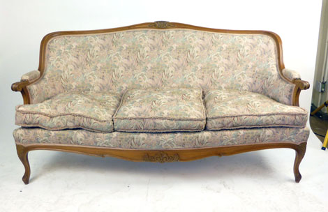 A 19th century-style beech framed three seater sofa in floral upholstery, h. 92 cm, w.