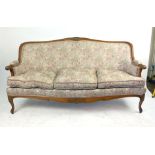 A 19th century-style beech framed three seater sofa in floral upholstery, h. 92 cm, w.