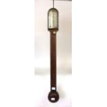 An 18th century flame mahogany dome top stick barometer with turned ivory knobs signed 'Brooks