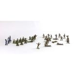 A collection of thirty two metal solders together with four metal bandsman to include machine