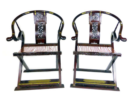 A pair of Chinese padouk and brass mounted folding chairs,